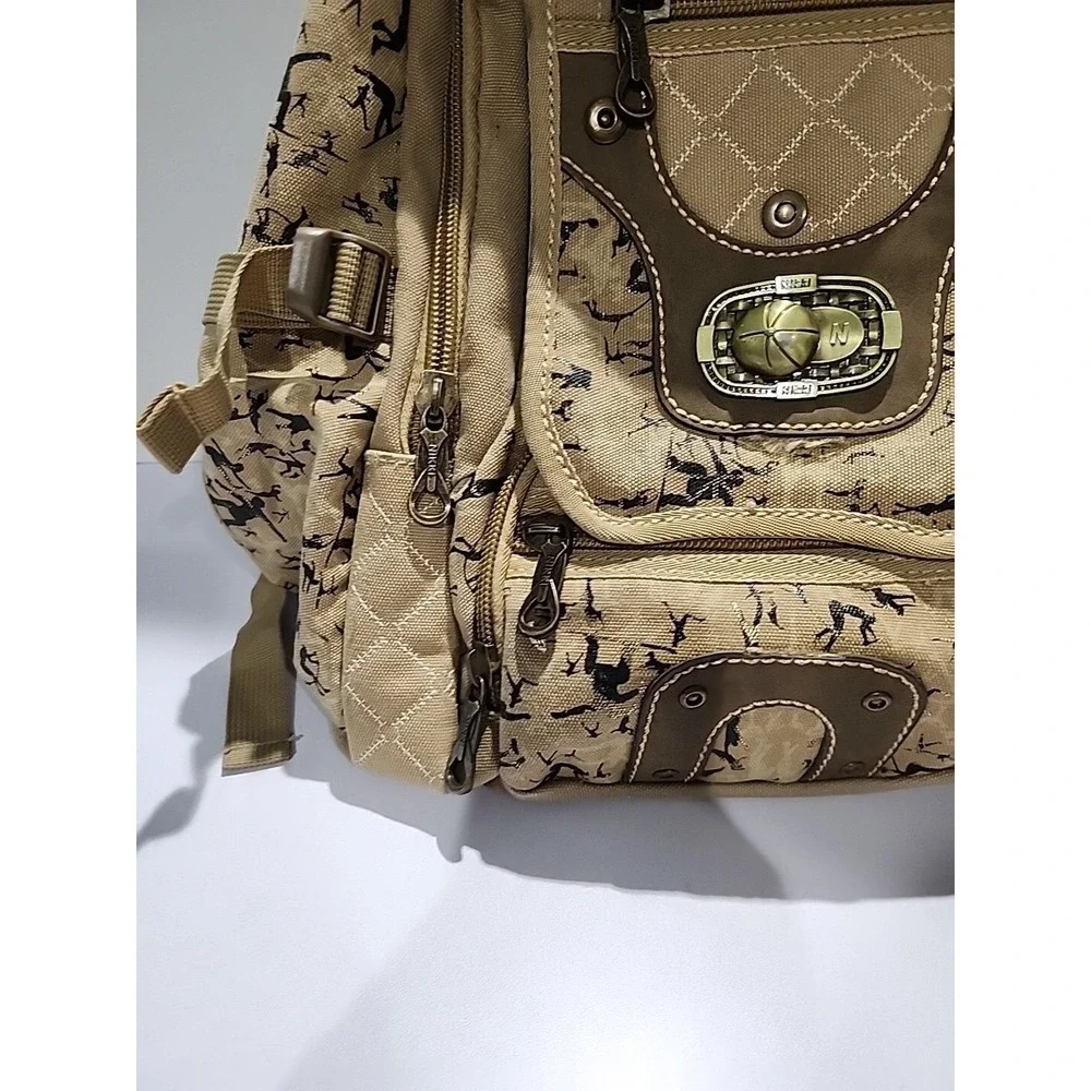Tan Khaki Canvas Backpack Silhouette Print Multi Pocket Travel Bag